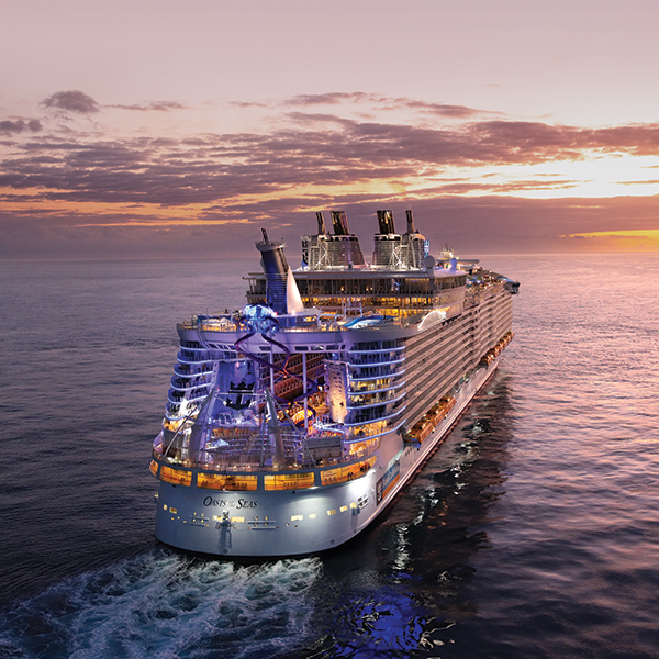OA, Oasis of the Seas, revite, amplified 2019, Aerials offshore Fort Lauderdale, sunset, evening, dusk, colorful lights on ship, starboard aft view,