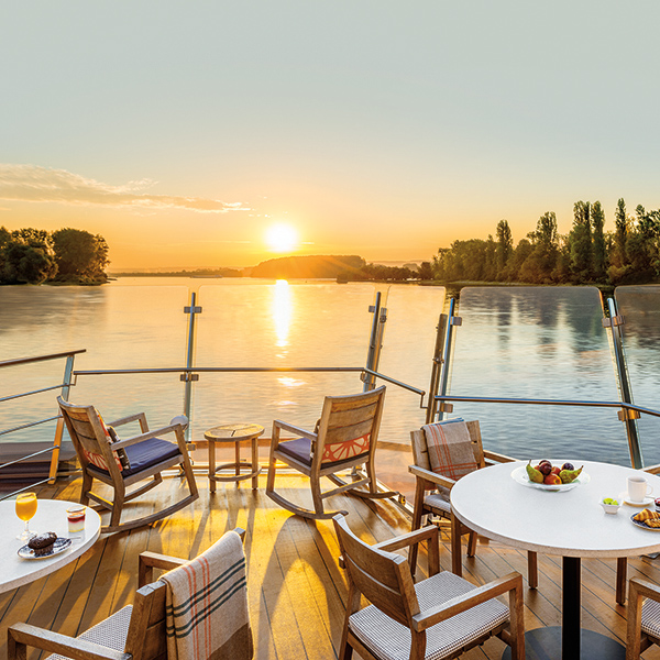 Aquavit Terrace at dawn with breakfast on the table onboard the Viking Longship Hlin in the Upper Middle Rhine Valley in Germany
