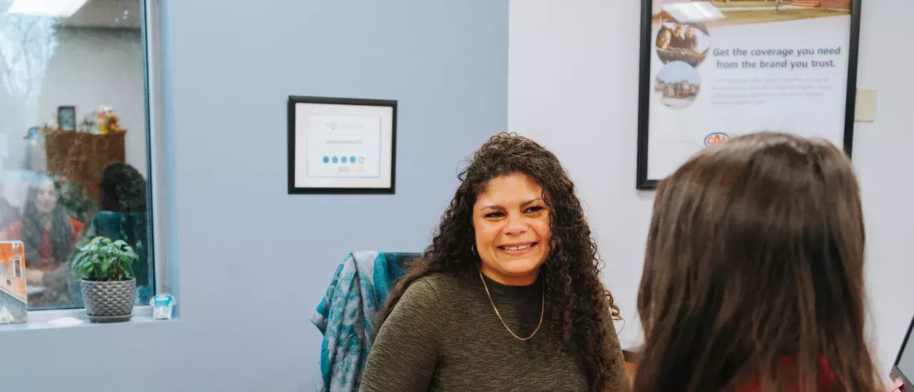 Travel advisor at CAA gives travel advice to a member