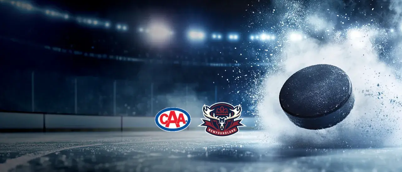 CAA logo and Newfoundland Regiment hocket logo beside a hockey puck on ice