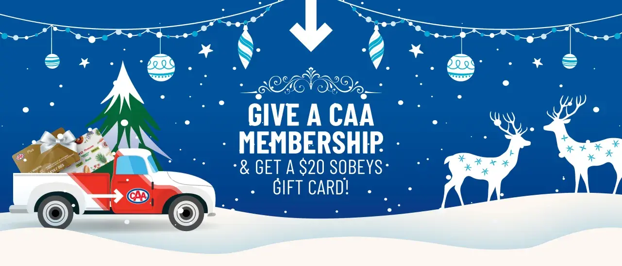Festive winter scene with CAA truck carrying gifts and text: “Give a CAA Membership & Get a $20 Sobeys Gift Card!”