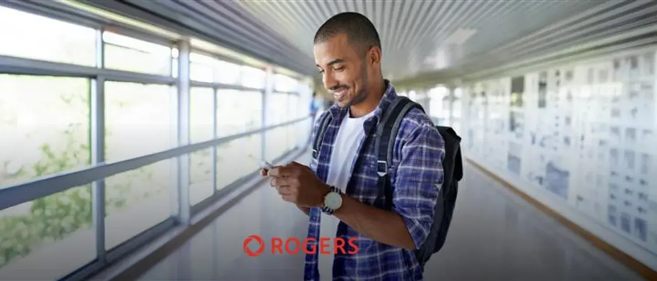 Person holding phone smiling