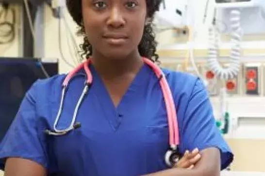 headshot of female ER doctor looking straight into the camera