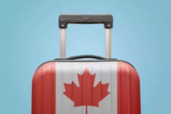 Photo of luggage with a Canadian Flag printed on it