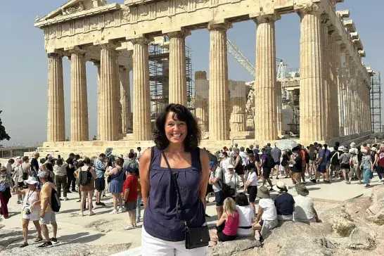 Linda isiting the Parthenon on the Acropolis, one of Athens' most iconic ancient landmarks in Greece.