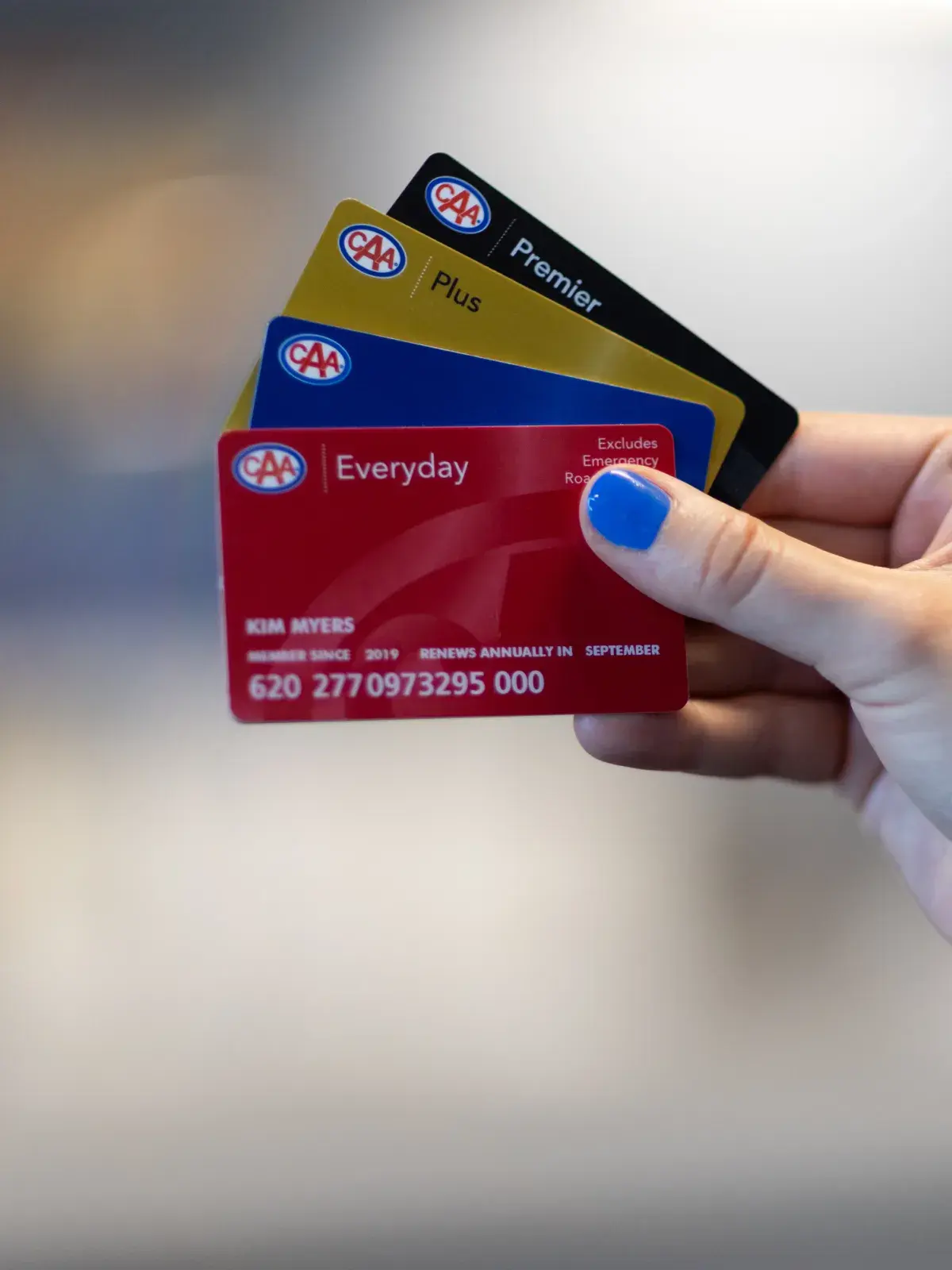 CAA membership cards in hand at our retail locations