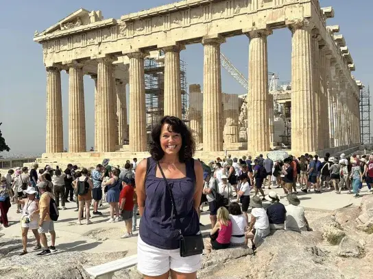 Linda isiting the Parthenon on the Acropolis, one of Athens' most iconic ancient landmarks in Greece.