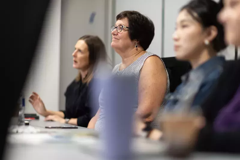 CAA staff attentive in a meeting