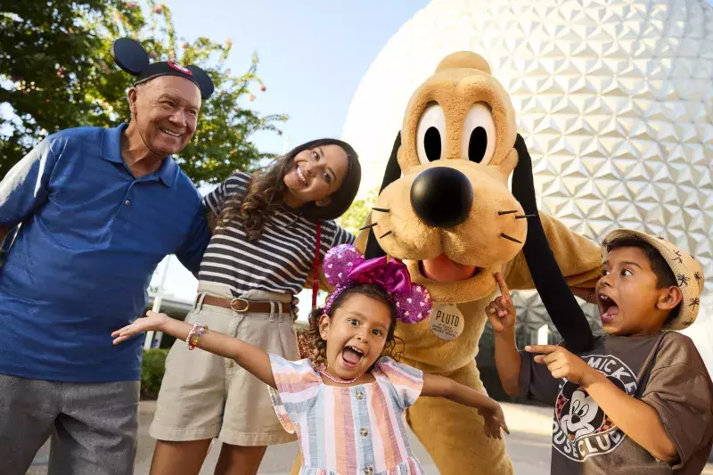 Epcot guests with Pluto 