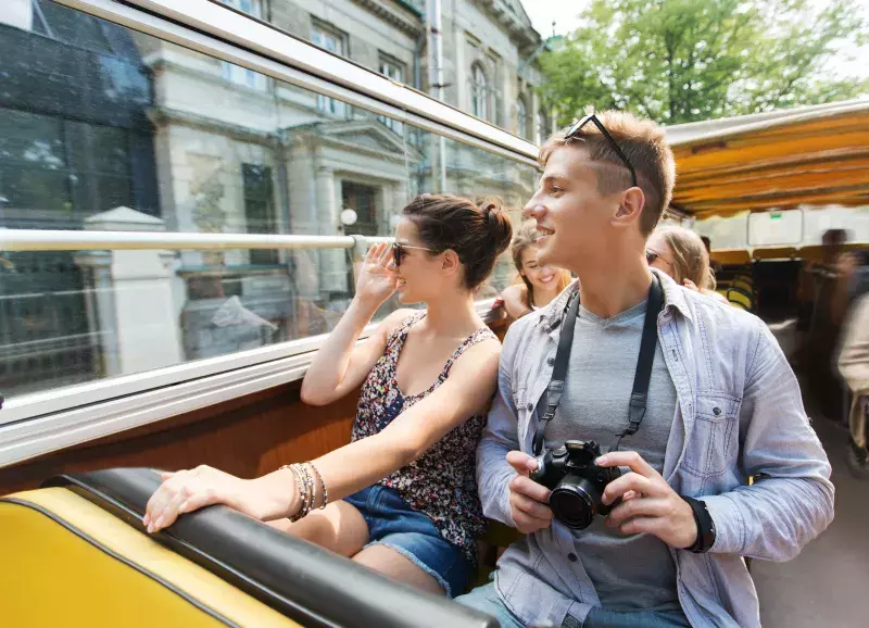 A couple on a tour bus