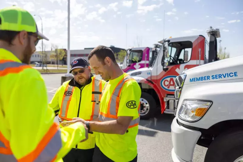 CAA Roadside Technicians having a meeting