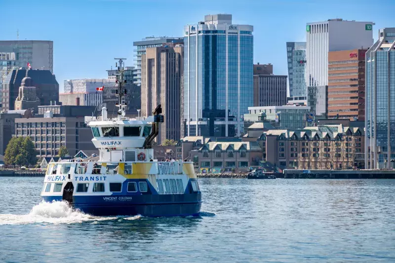 Halifax Transit Ferry crossing the harbour to Dartmouth and Halifax downtown in the background