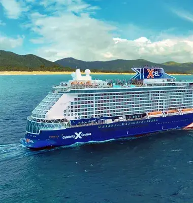 Xcel Celebrity Cruise Ship on the water with a tropical background