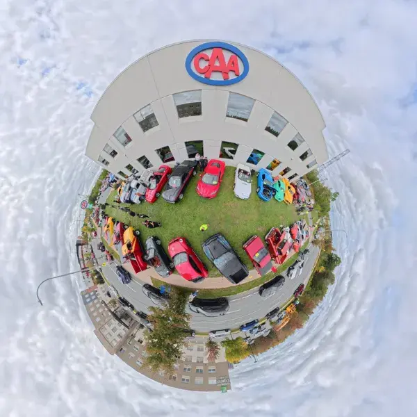 360-degree aerial view of the CAA Atlantic Show & Shine Car Show, featuring vehicles displayed on the lawn surrounding the Dartmouth branch.